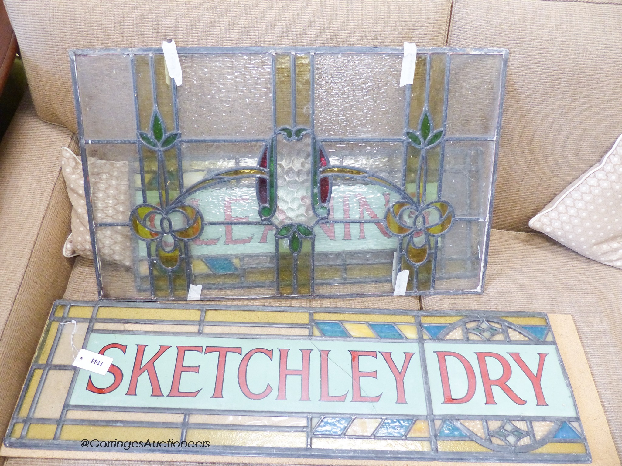 'Sketchley Dry Cleaning', two leaded stained glass panels in two sections circa 1930 total W-188, D-30cm, and an Art Nouveau glass panel.